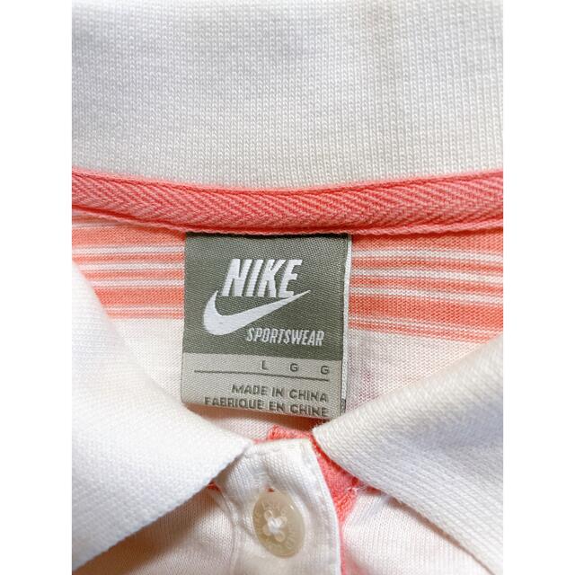 NIKE(ナイキ)の美品　ナイキ　ゴルフポロシャツ　ホワイト×ピンクボーダー スポーツ/アウトドアのゴルフ(ウエア)の商品写真