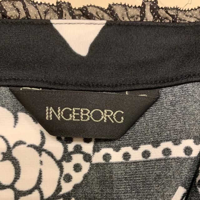 INGEBORG   黒地カメリアロゴ入チュニック