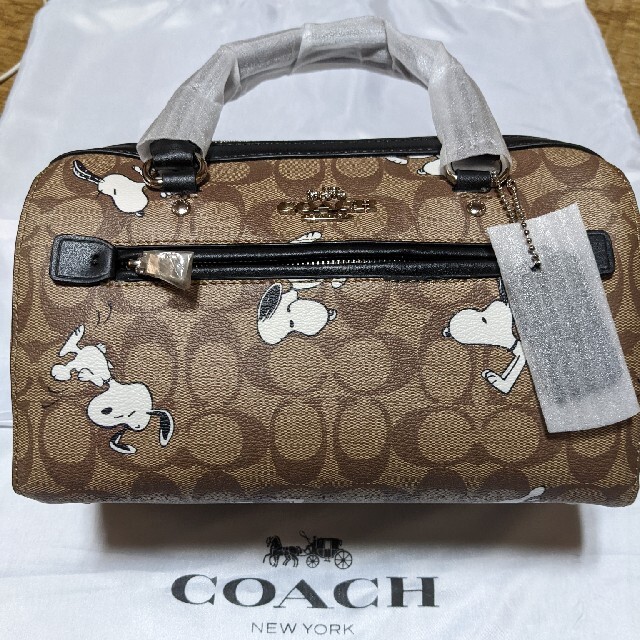 COACH(コーチ)のCOACH  ミニバッグ　シグネチャー　スヌーピー レディースのバッグ(ハンドバッグ)の商品写真