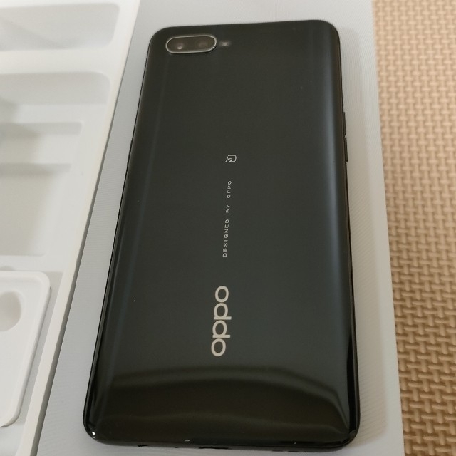 OPPO(オッポ)の【中古】OPPO RenoAブラック 64GB スマホ/家電/カメラのスマートフォン/携帯電話(スマートフォン本体)の商品写真