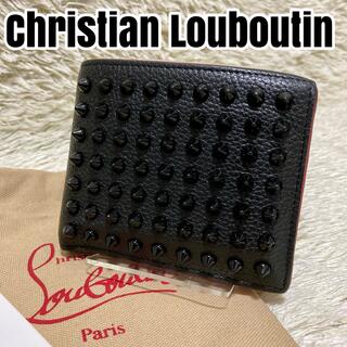 クリスチャンルブタン(Christian Louboutin)の保存袋付✨クリスチャンルブタン 二つ折り財布 パネトーネ スパイクスタッズ 黒(財布)