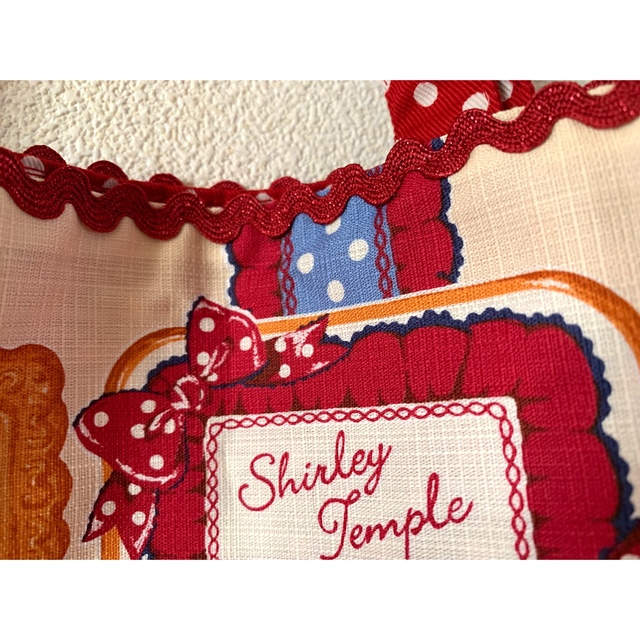 Shirley Temple(シャーリーテンプル)のシャーリーテンプル🎀ビスケットプリントバッグ アイボリー キッズ/ベビー/マタニティのこども用バッグ(トートバッグ)の商品写真