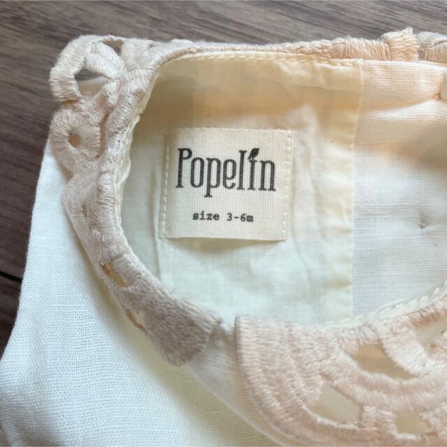 Bonpoint(ボンポワン)のPopelin ポペリン ノースリーブフリルロンパース 3-6M キッズ/ベビー/マタニティのベビー服(~85cm)(ロンパース)の商品写真