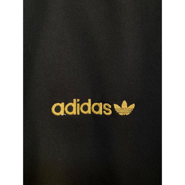 adidas(アディダス)のadidas アディダス トレフォイル刺繍 総柄 ジャージ  ブラック×ゴールド メンズのトップス(ジャージ)の商品写真