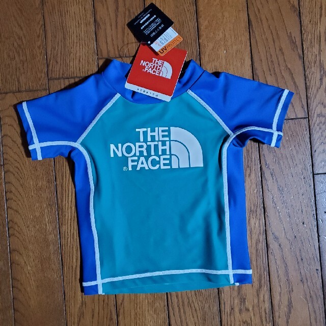 THE NORTH FACE(ザノースフェイス)の💙最終お値下げ中💙ザノースフェイス◎半袖ラッシュガード80cm キッズ/ベビー/マタニティのベビー服(~85cm)(水着)の商品写真