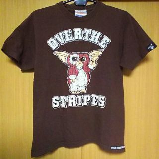 オーバーザストライプス(OVER THE STRIPES)のコラボ☆オーバーザストライプスGIZMOグレムリンMクラッキング加工Tシャツ茶色(Tシャツ/カットソー(半袖/袖なし))