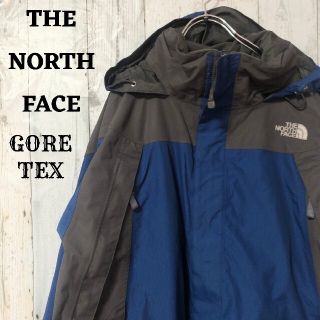 ザノースフェイス(THE NORTH FACE)のUS規格ノースフェイスマウンテンパーカーゴアテックス刺繍ロゴブルーグレー古着(マウンテンパーカー)