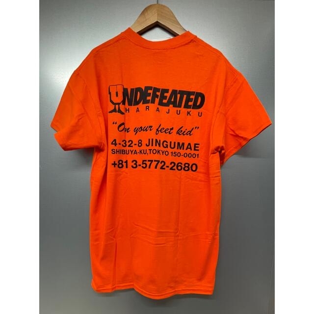 UNDEFEATED(アンディフィーテッド)のUNDEFEATED  リージョンTシャツHARAJUKU【Mサイズ/オレンジ】 メンズのトップス(Tシャツ/カットソー(半袖/袖なし))の商品写真