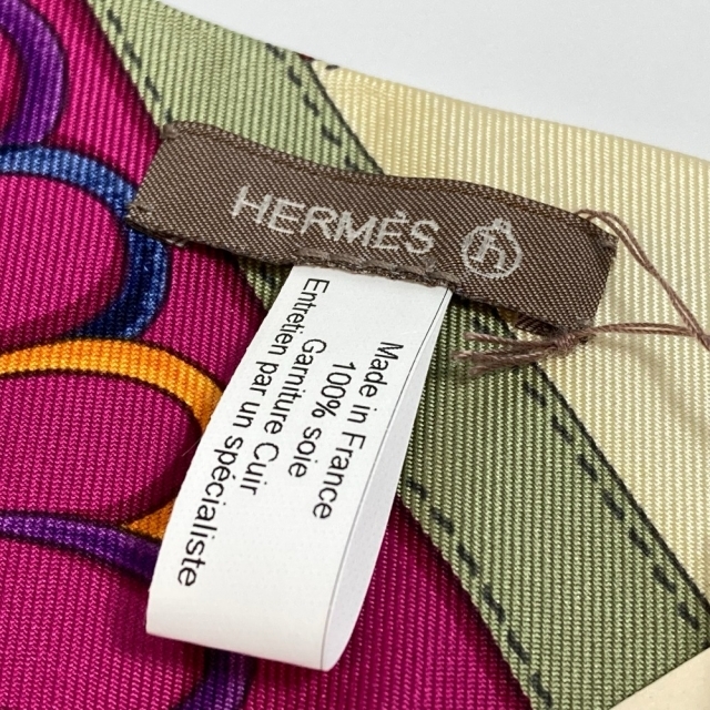 Hermes(エルメス)のエルメス HERMES 総柄  BANDEAU H ET F SOIE AGNEAU バンドー ヘアバンド シルク マルチカラー 未使用 レディースのヘアアクセサリー(ヘアバンド)の商品写真