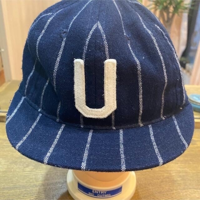 AURALEE(オーラリー)のユニバーサル　プロダクツ　ベースボールキャップ　サイズ7 1/2 メンズの帽子(キャップ)の商品写真