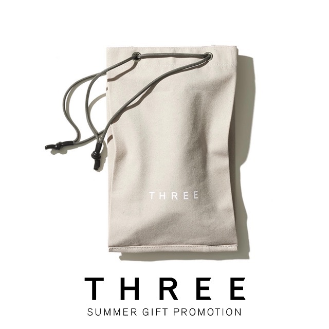 THREE(スリー)の【サンプル付き】THREE ドローストリングバッグ コスメ/美容のコスメ/美容 その他(その他)の商品写真