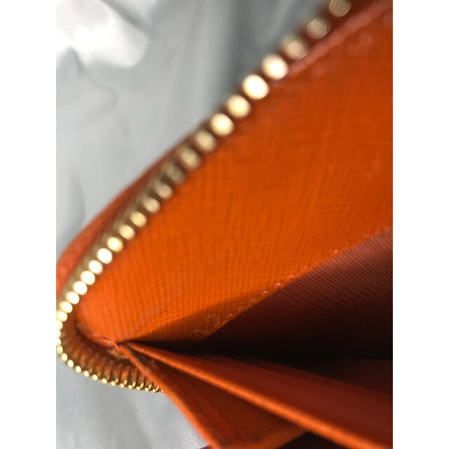PRADA(プラダ)のmiki様専用　超美品　PRADA プラダ ラウンドファスナー　リボン　オレンジ レディースのファッション小物(財布)の商品写真