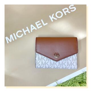 マイケルコース(Michael Kors)の【新品】MKレディース用ロゴ折財布（バニラホワイト）JET SET(財布)