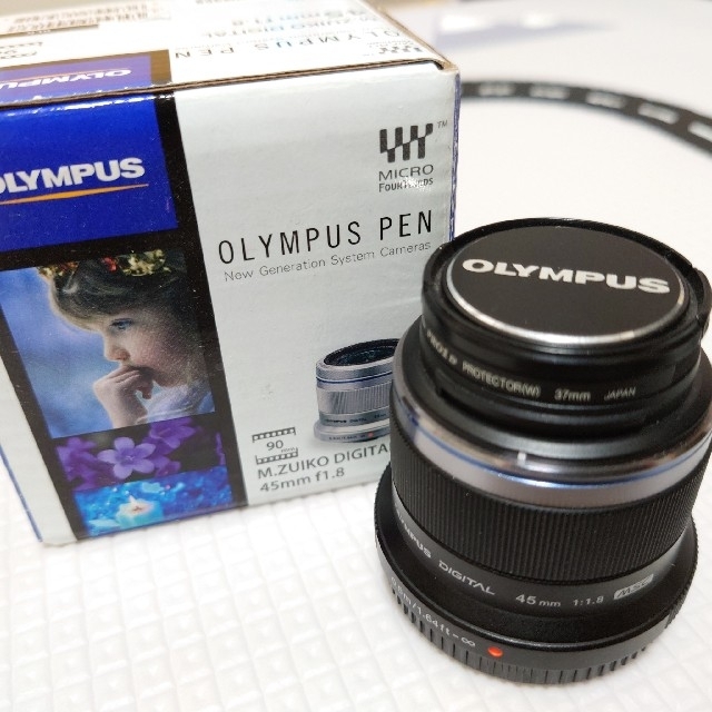 OLYMPUS(オリンパス)のスイーツ様専用 M.ZUIKO DIGITAL 45mm F1.8 フィルター付 スマホ/家電/カメラのカメラ(レンズ(単焦点))の商品写真