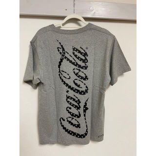 エフシーアールビー(F.C.R.B.)の【人気・新品未使用】 F.C.Real Bristol×コカコーラ　Lサイズ　(Tシャツ/カットソー(半袖/袖なし))