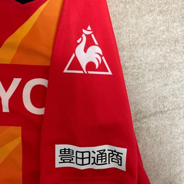 le coq sportif(ルコックスポルティフ)の名古屋グランパス　ユニフォーム スポーツ/アウトドアのサッカー/フットサル(応援グッズ)の商品写真