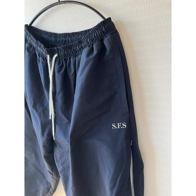 1LDK SELECT(ワンエルディーケーセレクト)のS.F.S Embroidered Track Pants(Midnight) メンズのパンツ(その他)の商品写真