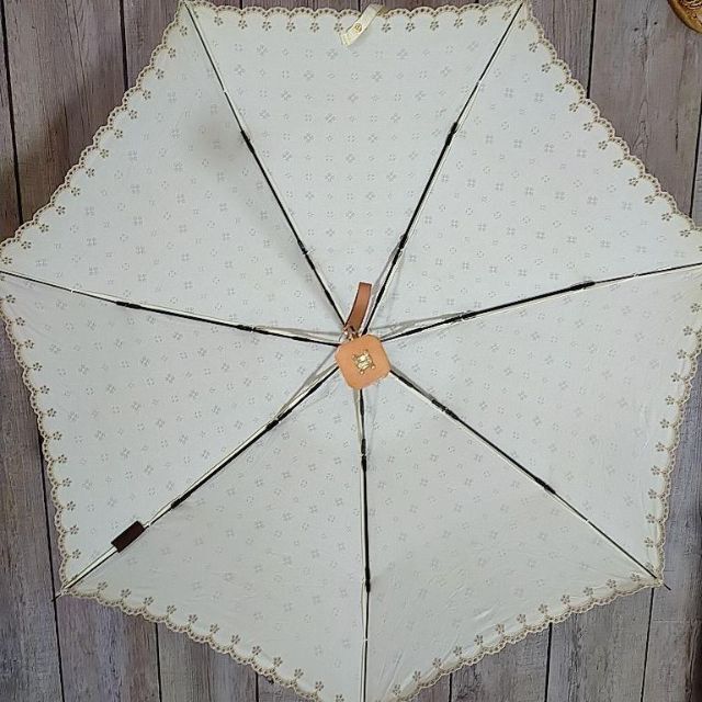 celine(セリーヌ)のセリーヌ　日傘　折りたたみ　花柄　ロゴ　傘袋付き　ベージュ レディースのファッション小物(傘)の商品写真