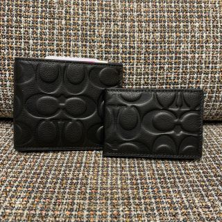 コーチ(COACH)の74992 コーチ　二つ折り財布　ブラックシグネチャー(折り財布)