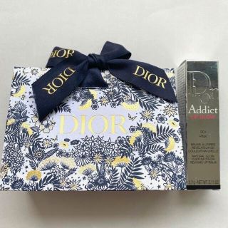 ディオール(Dior)の【新品未使用】Diorリップグロウ001ピンク　ラッピング袋付(リップケア/リップクリーム)