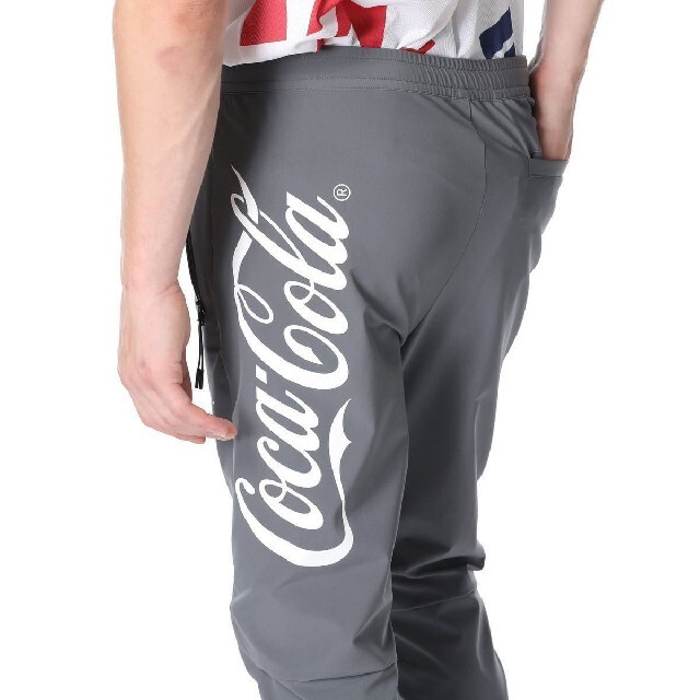 F.C.R.B.(エフシーアールビー)のF.C.R.B Coca-cola WARM UP PANTS (グレー:M) メンズのパンツ(その他)の商品写真