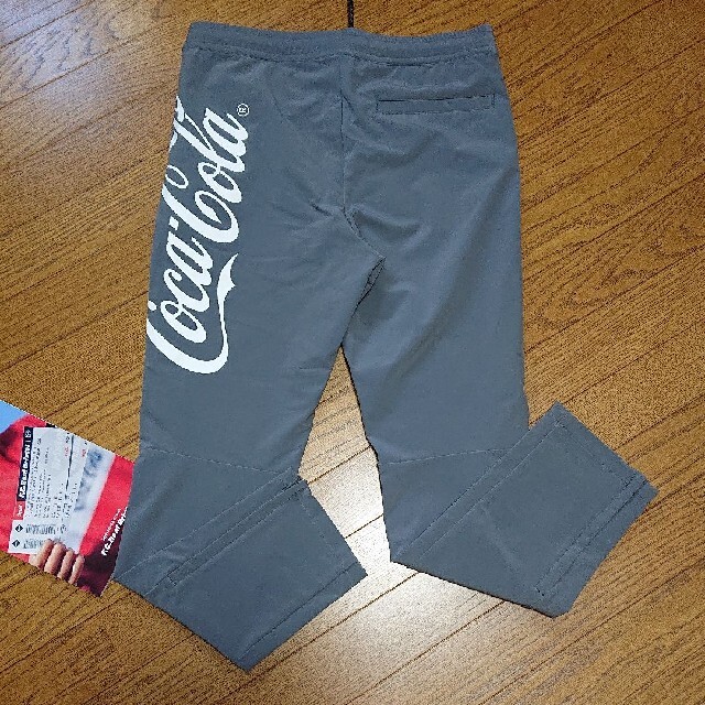 F.C.R.B.(エフシーアールビー)のF.C.R.B Coca-cola WARM UP PANTS (グレー:M) メンズのパンツ(その他)の商品写真