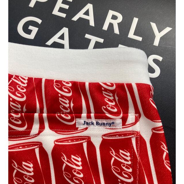 PEARLY GATES(パーリーゲイツ)の新品 ジャックバニー コカ・コーラ アルミ缶柄 ショートパンツ(5)サイズL/赤 スポーツ/アウトドアのゴルフ(ウエア)の商品写真
