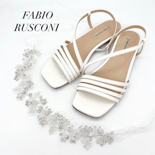 ファビオルスコーニ(FABIO RUSCONI)の【極美品】ファビオルスコーニ スリムストラップサンダル 37 ホワイト 23.5(サンダル)