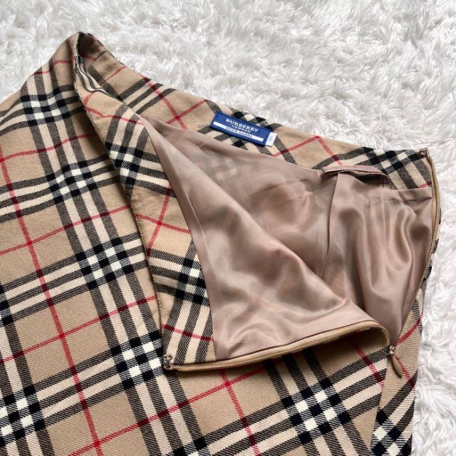 BURBERRY BLUE LABEL(バーバリーブルーレーベル)のyaya 様専用バーバリー　ノバチェック　　Aライン　ウール　裏地付き　38 レディースのスカート(ひざ丈スカート)の商品写真