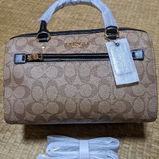 コーチ(COACH)のCOACH  ミニバッグ　シグネチャー　黒のワンポイント(ハンドバッグ)