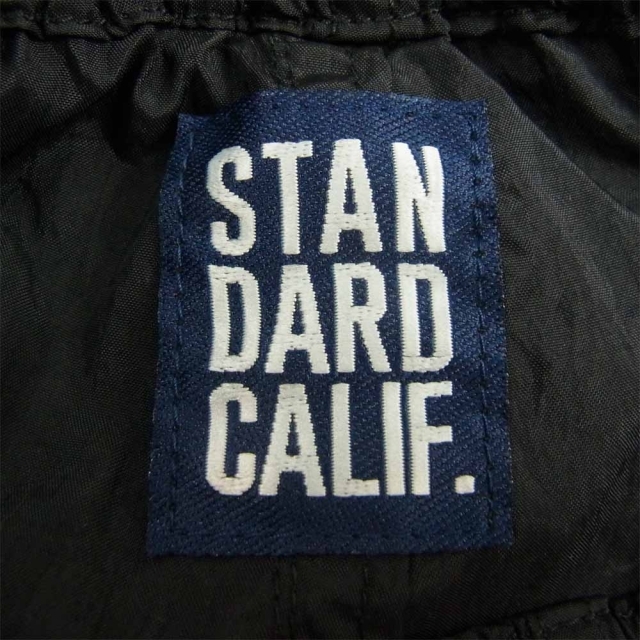 STANDARD CALIFORNIA(スタンダードカリフォルニア)のSTANDARD CALIFORNIA スタンダードカリフォルニア ショートパンツ ナイロン ハーフパンツ ショーツ ブラック系 M【美品】【中古】 メンズのパンツ(その他)の商品写真