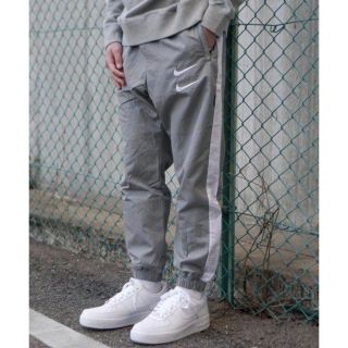 NIKE - nike swoosh ナイキ ダブルスウォッシュ ナイロンパンツの通販