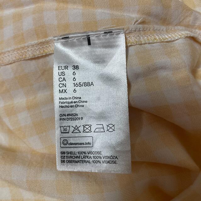 H&M(エイチアンドエム)のH&M 黄色チェックミニ丈トップス レディースのトップス(Tシャツ(半袖/袖なし))の商品写真
