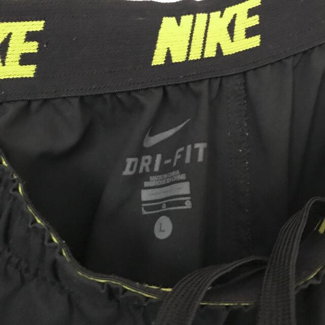 NIKE(ナイキ)のNIKE ナイキ★DRY-FIT★ルーズ★刺繍スウッシュ★ナイロンパンツ★L メンズのパンツ(その他)の商品写真