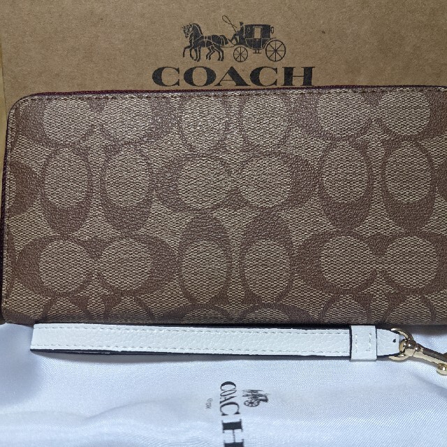 COACH(コーチ)のCOACH  長財布　シグネチャー　スヌーピー２ レディースのファッション小物(財布)の商品写真