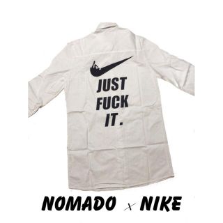 ナイキ(NIKE)のNOMADO NIKE  シャツ 新品未使用(染み有) (シャツ)