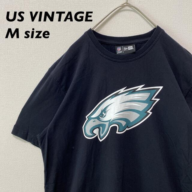 US古着　NFL 半袖Tシャツ　プリントロゴ　イーグルス　Mサイズ　男女兼用　黒 メンズのトップス(Tシャツ/カットソー(半袖/袖なし))の商品写真