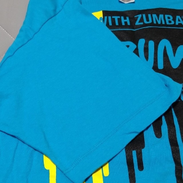 Zumba(ズンバ)のUSED Zumba ズンバ　男女兼用フリーサイズ　Tシャツ スポーツ/アウトドアのトレーニング/エクササイズ(トレーニング用品)の商品写真