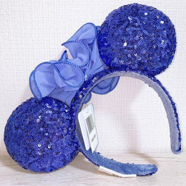Disney(ディズニー)の新品タグ付き ミニーちゃん カチューシャ スパンコール パープルブルー レディースのヘアアクセサリー(カチューシャ)の商品写真