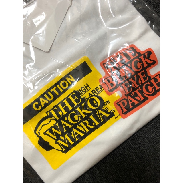 WACKO MARIA(ワコマリア)の【新品】Wacko Maria BLACK EYE PATCH ロゴTシャツ メンズのトップス(Tシャツ/カットソー(半袖/袖なし))の商品写真