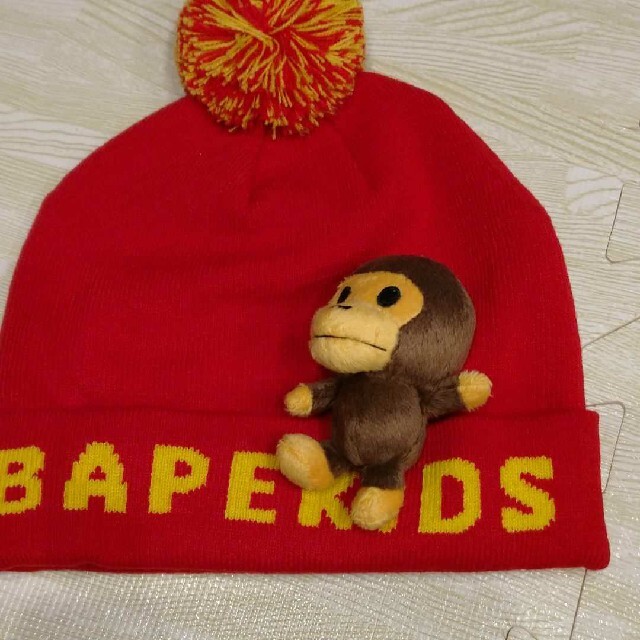 A BATHING APE(アベイシングエイプ)のBAPE KIDS BABY MILO PLUSH DOLL KNIT CAP キッズ/ベビー/マタニティのこども用ファッション小物(帽子)の商品写真