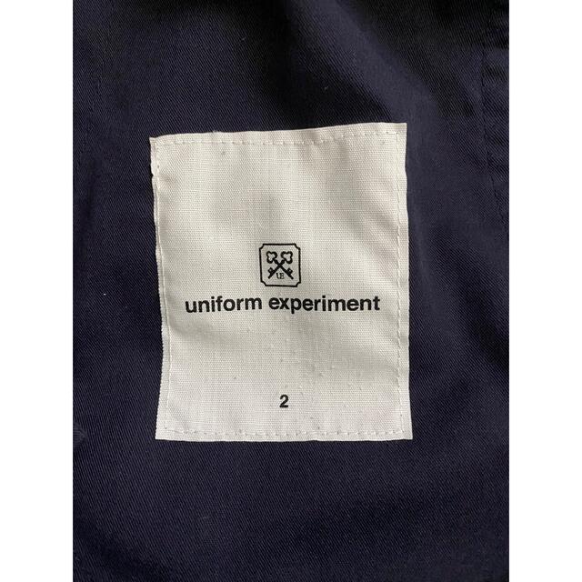 uniform experiment(ユニフォームエクスペリメント)のUE STRETCH WOOL CARROT FIT CROPPED PANTS メンズのパンツ(その他)の商品写真