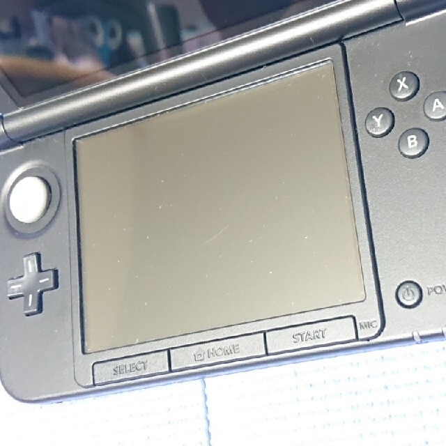 ニンテンドー3DS(ニンテンドー3DS)のニンテンドー3DS LL  レッド×ブラック エンタメ/ホビーのゲームソフト/ゲーム機本体(携帯用ゲーム機本体)の商品写真