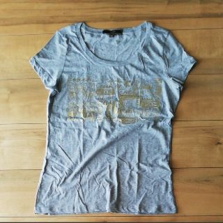 コーチ(COACH)のコーチ　半袖Tシャツ　未使用　附属ポーチつき(Tシャツ(半袖/袖なし))