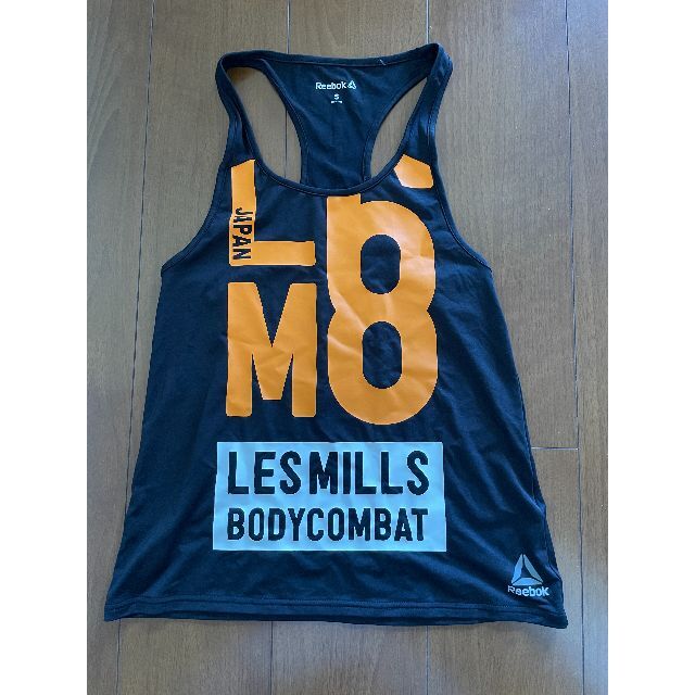 Reebok(リーボック)のLes Mills ノースリーブ黒 サイズS（女性） スポーツ/アウトドアのスポーツ/アウトドア その他(その他)の商品写真