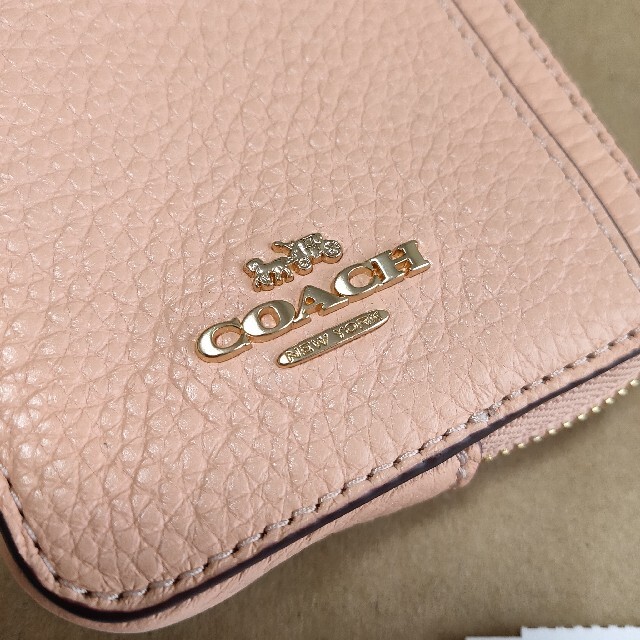 COACH(コーチ)の人気★COACH コーチ ジップカードケース チャーム付き ピンク オレンジ レディースのファッション小物(名刺入れ/定期入れ)の商品写真