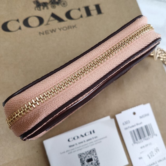 COACH(コーチ)の人気★COACH コーチ ジップカードケース チャーム付き ピンク オレンジ レディースのファッション小物(名刺入れ/定期入れ)の商品写真