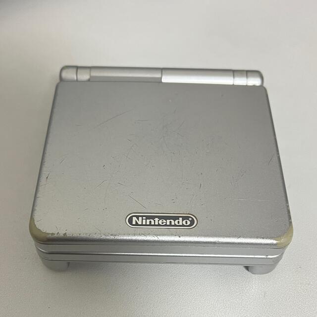 任天堂(ニンテンドウ)のGBA SP プラチナシルバー、充電器、ワイヤレスアダプタ、通信ケーブル エンタメ/ホビーのゲームソフト/ゲーム機本体(携帯用ゲーム機本体)の商品写真