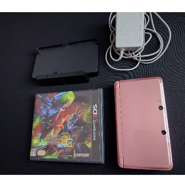 ニンテンドー3DS(ニンテンドー3DS)の【値下げ】《送料込》任天堂 ３ＤＳミスティピンク本体＋モンスターハンター3G等 エンタメ/ホビーのゲームソフト/ゲーム機本体(携帯用ゲーム機本体)の商品写真