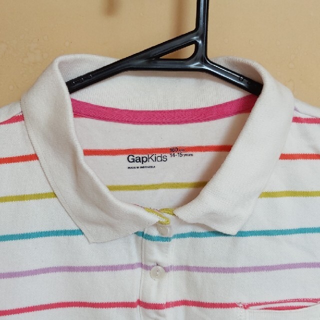 GAP Kids(ギャップキッズ)のGapKids 女の子 ポロシャツ 160cm 14-15years 白カラフル キッズ/ベビー/マタニティのキッズ服女の子用(90cm~)(Tシャツ/カットソー)の商品写真